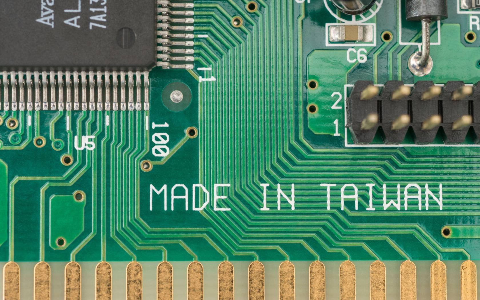 Made in Taiwan printed on the surface of a circuit board.