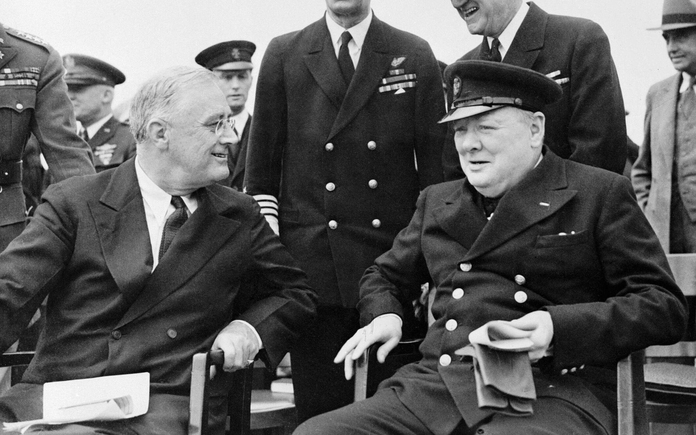Franklin Delano Roosevelt and Winston Churchill aboard HMS Prince of Wales for the 1941 Atlantic Charter meeting.
