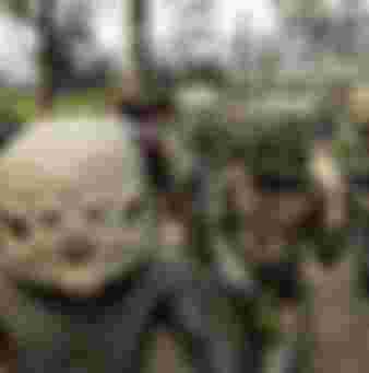 saro mud men from Goroka walk to the annual sing-sing cultural festival in Mount Hagen in 2004. Over 70 tribes put aside their ethnic tensions to come together once a year in the remote frontier town to celebrate the cultural diversity of Papua New Guinea. Credit: TORSTEN BLACKWOOD/AFP via Getty Images