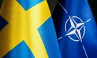 The flags of NATO and Sweden in Kyiv, Ukraine.