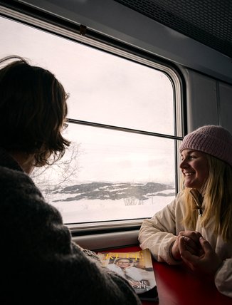 couples travel by train to Björkliden