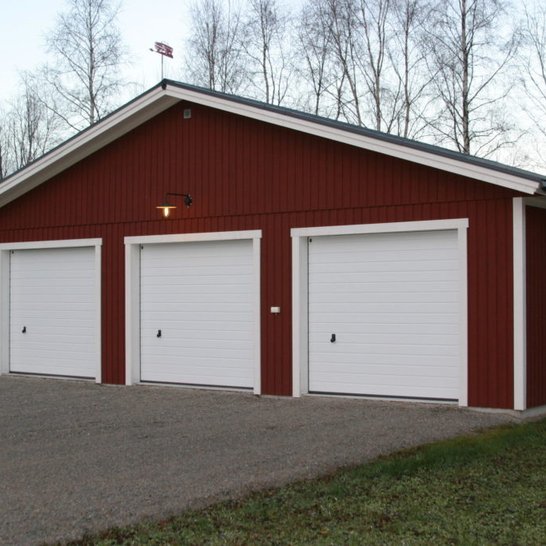 Triple white large garage space