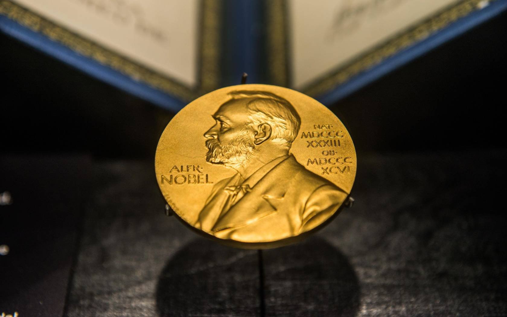 A golden image of a Nobel Prize decorates the front of the Science Museum in Singapore