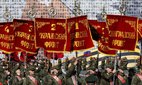 Russian servicemen carry a banner with the inscription "Ukrainian Front" during a rehearsal for the Victory Day Parade on Palace Square in St. Petersburg, on 17 January 2025.