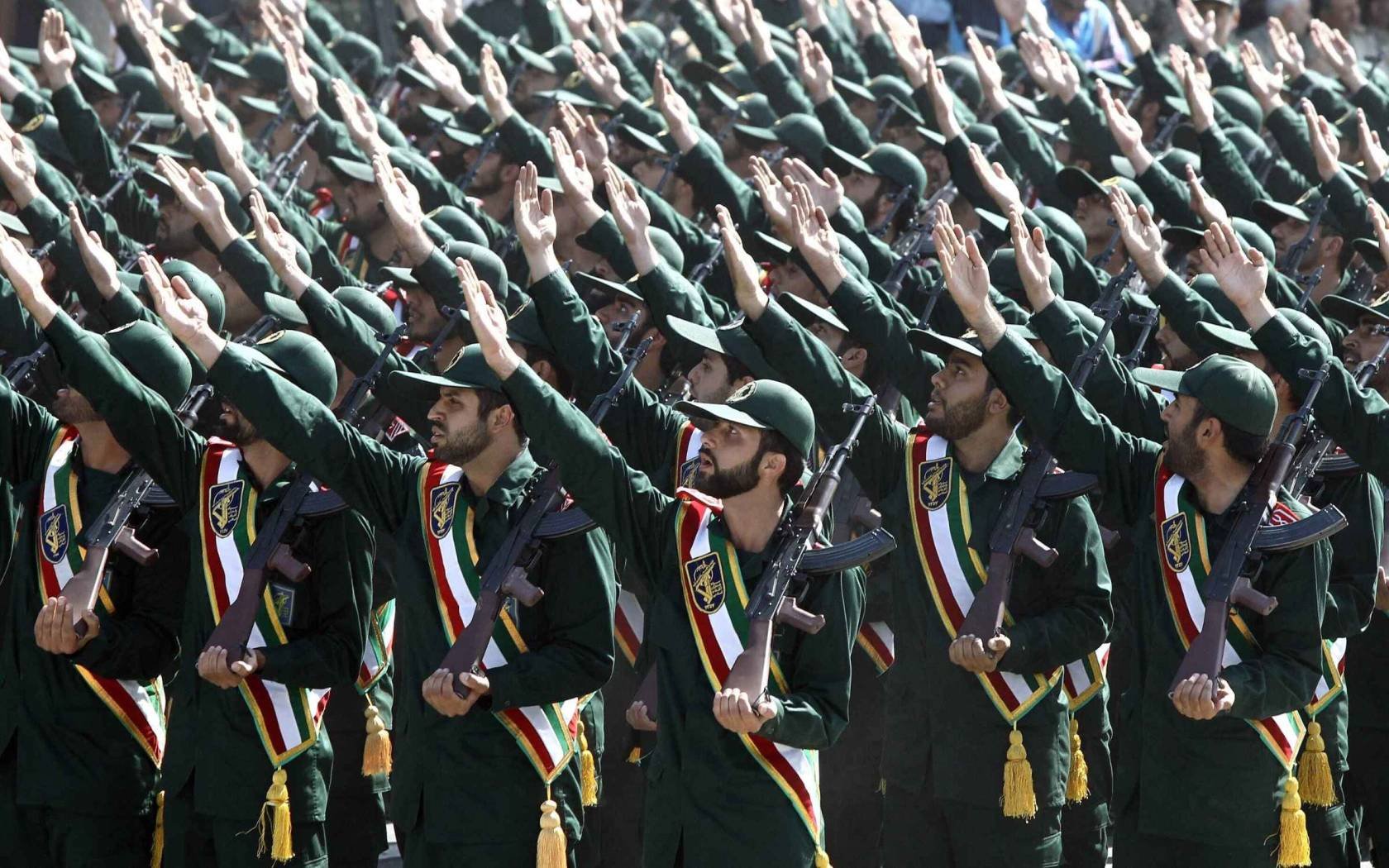 Iranian Revolutionary Guards march during an annual military parade in Tehran, Iran, in September 2013.
