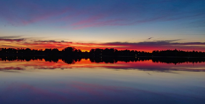 Solnedgång över Osbysjön. Foto: Osby Camping 