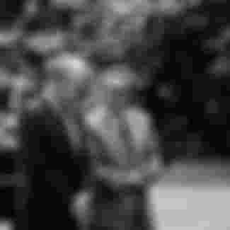 President Gerald Ford and U.S. Secretary of State Henry Kissinger conversing in the grounds of the White House in 1974.