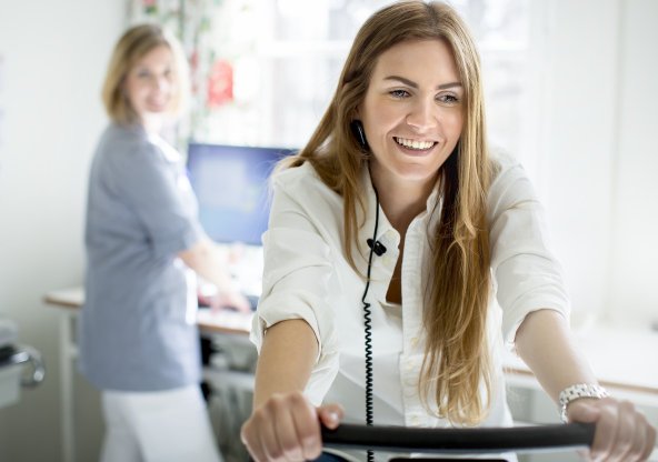 Patient på motionscykel