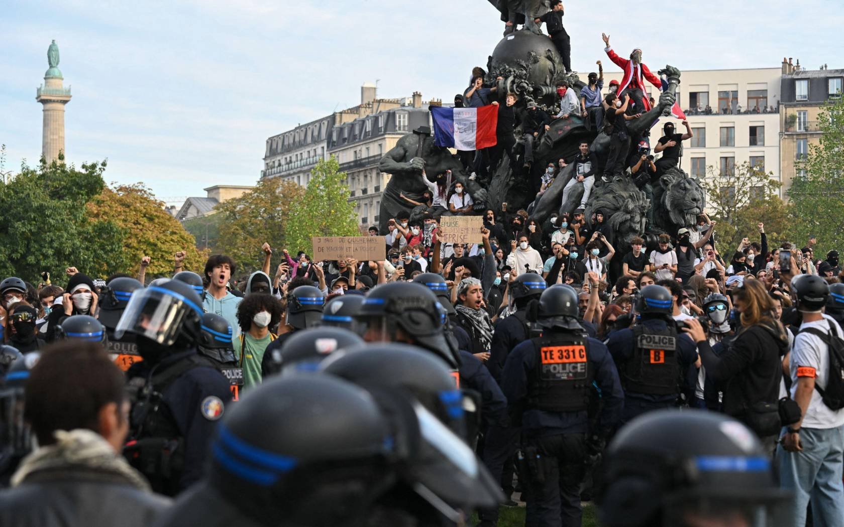 High school pupils occupy the statue in Place de la Nation in Paris.