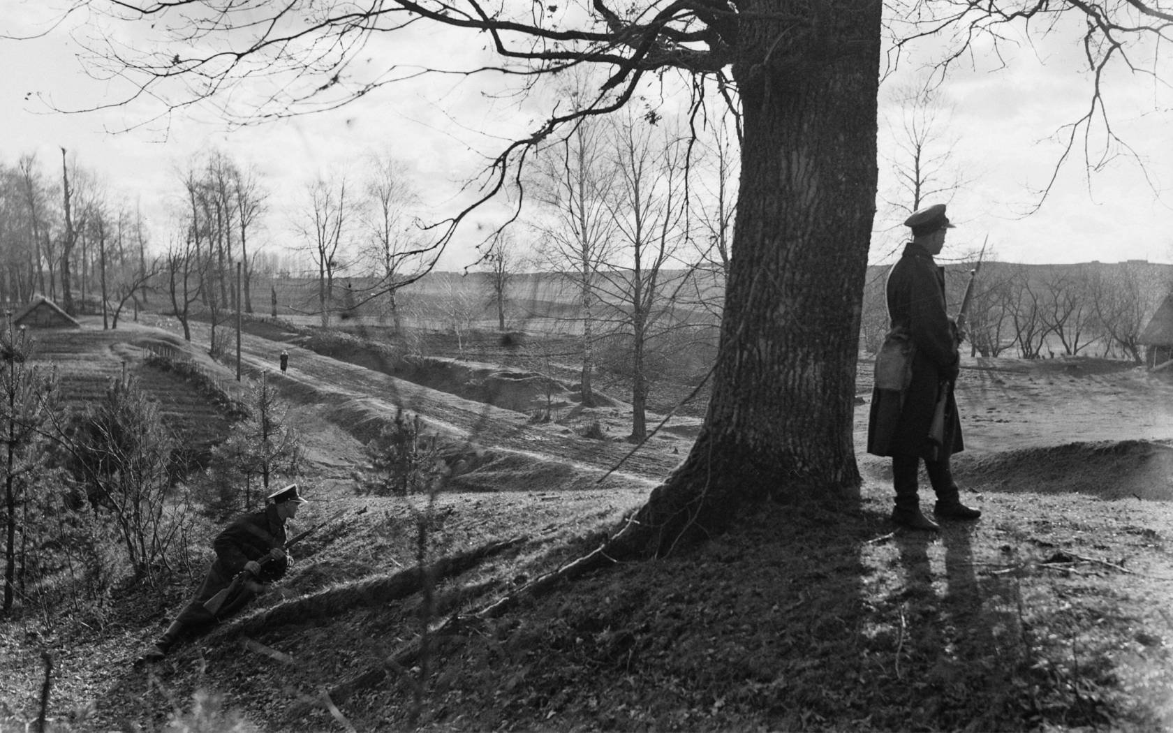 Two soldiers patrolling the forests near the Poland-Lithuania border