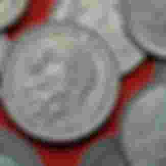 German statesman Konrad Adenauer depicted on a coin.