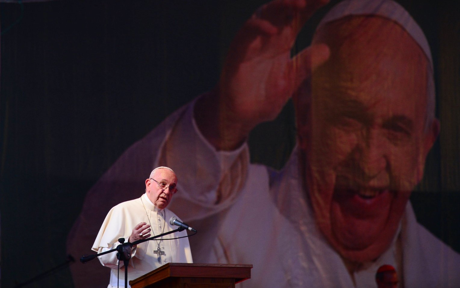 Pope Francis gives a speech during a meeting with young people at Notre Dame College in Dhaka on December 2, 2017
