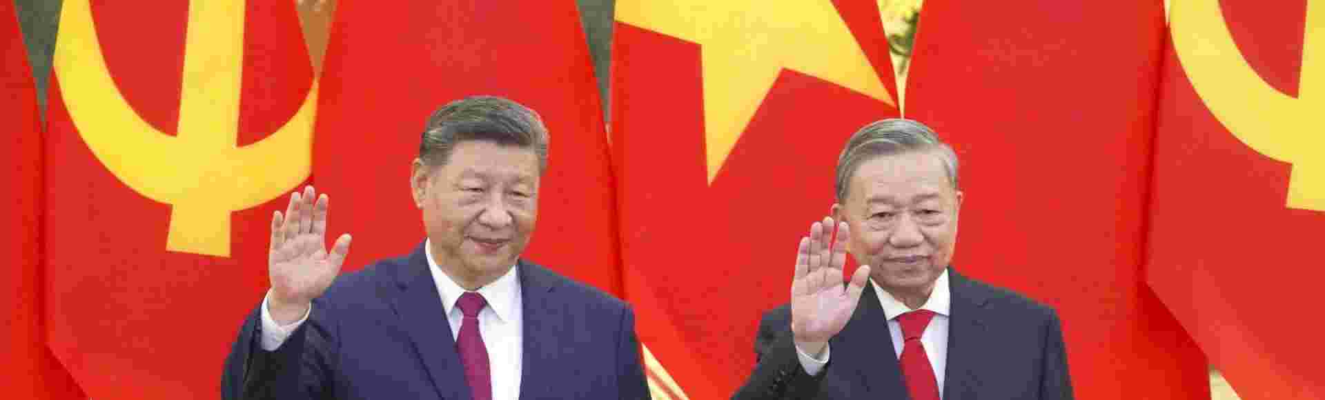 Chinese President Xi Jinping and Vietnamese President To Lam wave in Hanoi on April 14, 2025.