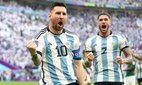 Argentina's Lionel Messi celebrates scoring their side's first goal of the game during the 2022 FIFA World, Qatar. Credit: PA Images / Alamy Stock Photo.