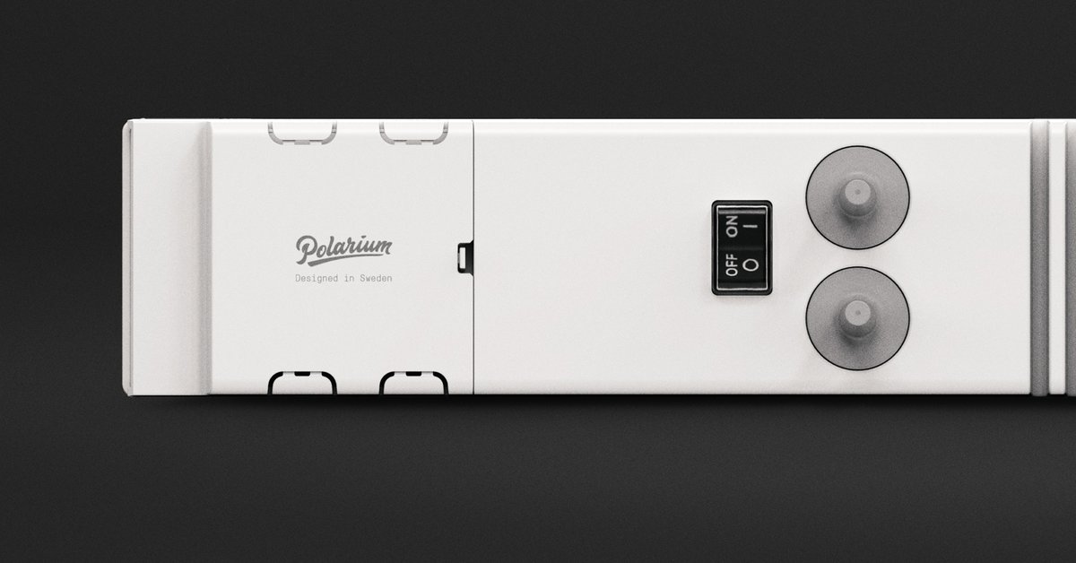 A close-up of a battery from Polarium showing an on/off button.