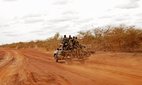 Sudan People's Liberation Army soldiers drive toward frontline positions near Pana Kuach in South Sudan on Friday May 11, 2012.