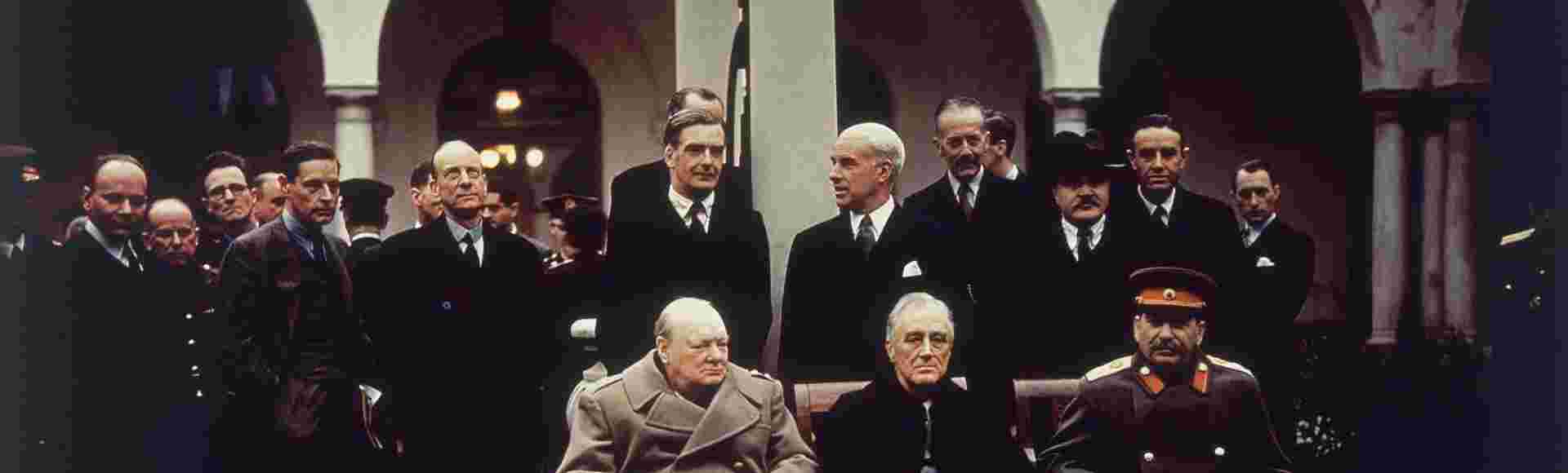 British Prime Minister Winston Churchill, US President Franklin Roosevelt and Soviet Dictator Joseph Stalin sit on the patio of Livadia Palace, Yalta, Crimea.