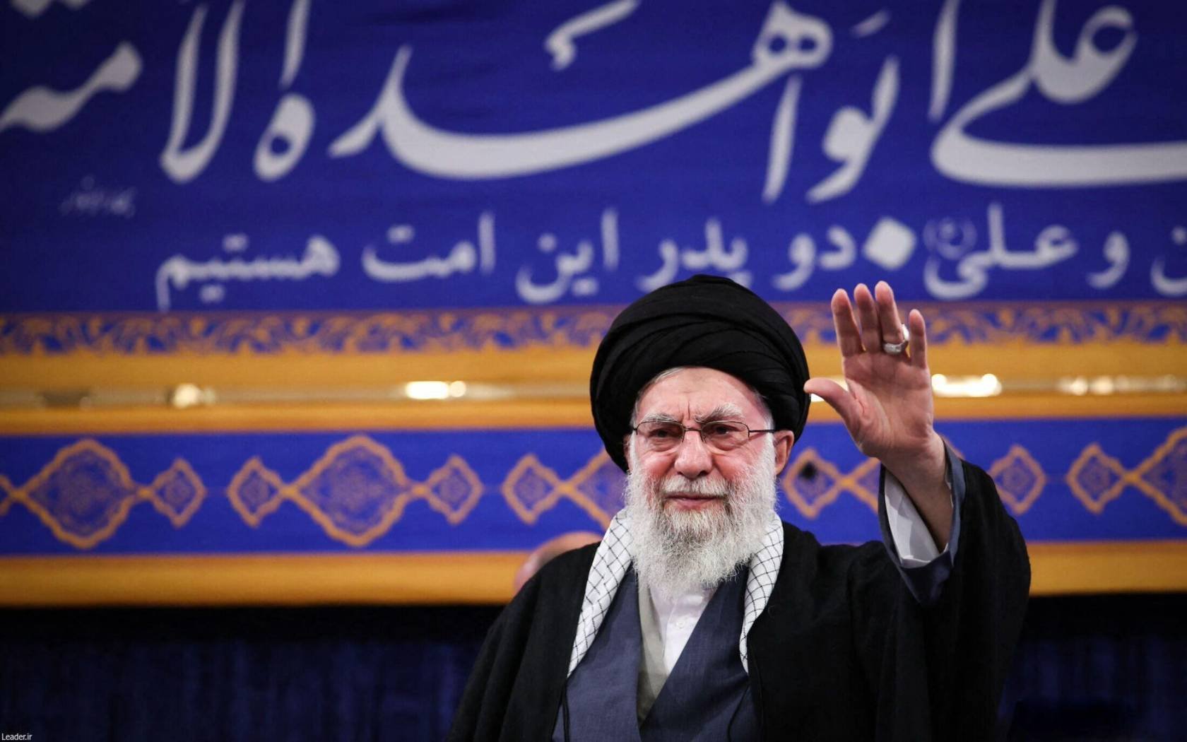 Iranian Supreme Leader Ayatollah Ali Khamenei waves during a ceremony marking the sixth anniversary of the death of Qassem Soleimani in Tehran, on 3 January 2026.