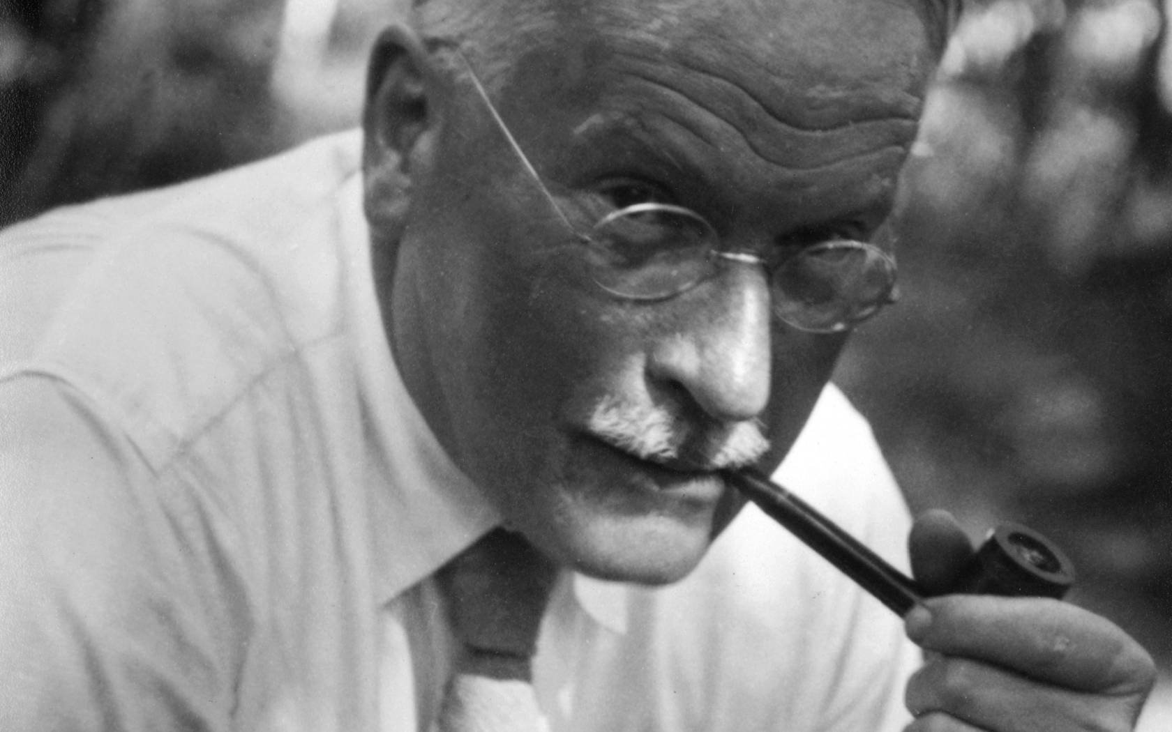 Carl Jung smoking a pipe in c. 1940.