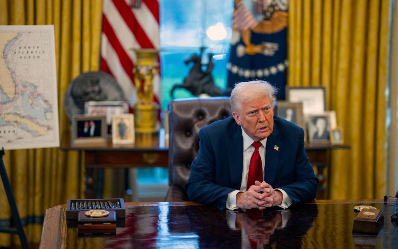 US President Donald Trump in the Oval Office, 26 March 2025.