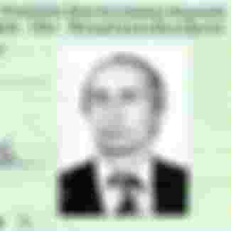 Vladimir Putin's East German Stasi identification card issued while he worked as a KGB agent in Dresden in 1985.