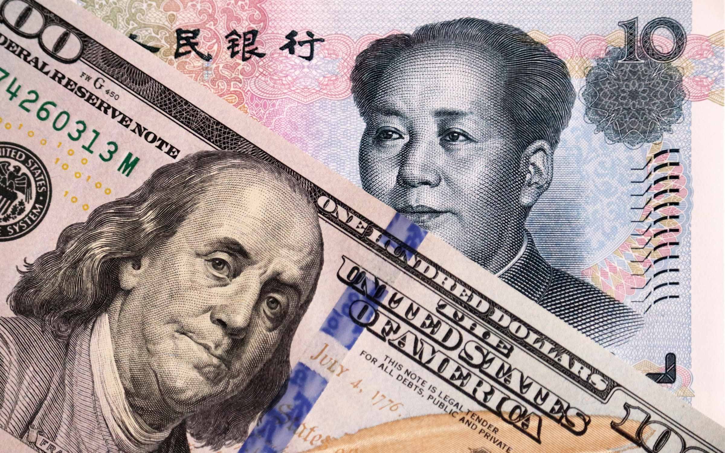 A US dollar and a Chinese yuan.