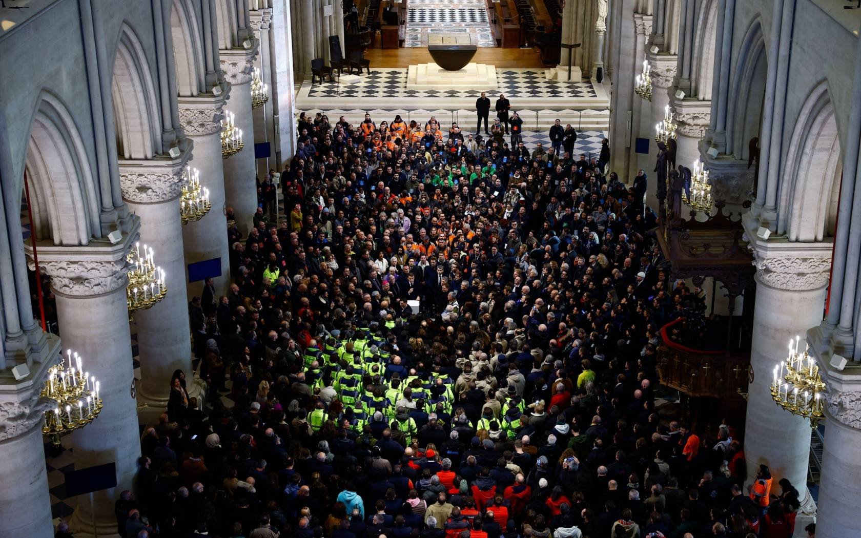 President Macron speaks to workers on the restoration of Notre Dame, 29 November 2024.