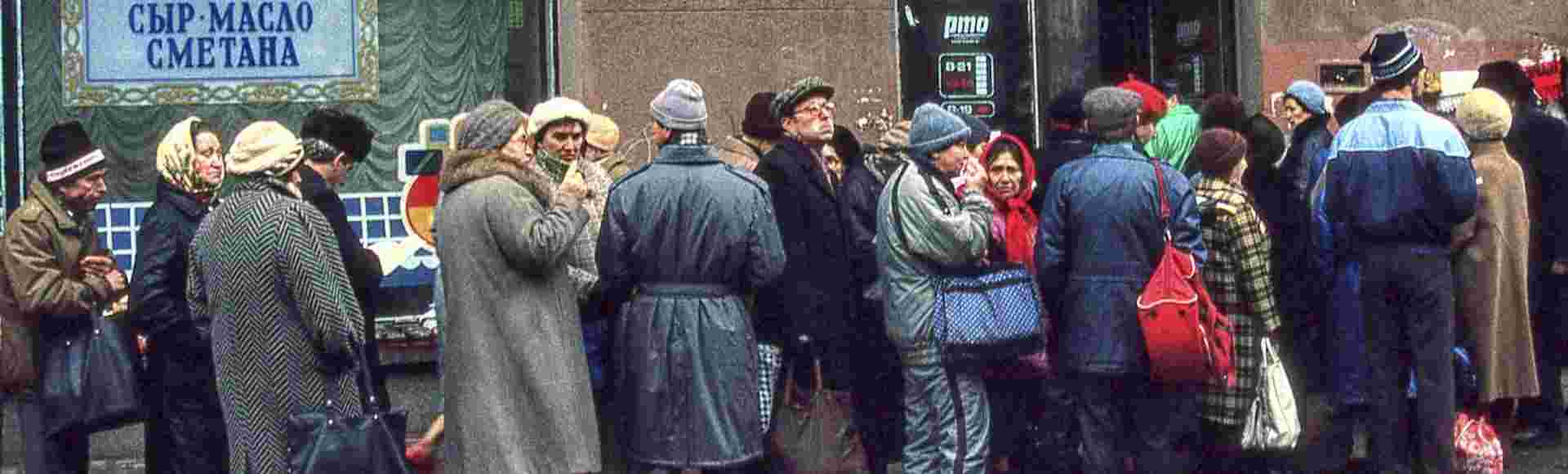 Muscovites queue up outside a shop selling milk and dairy products in Moscow during difficult economic times just before the dissolution of the USSR.