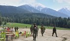 Indian security personnel inspect the site of a militant attack on tourists at Pahalgam in Indian-controlled Kashmir.