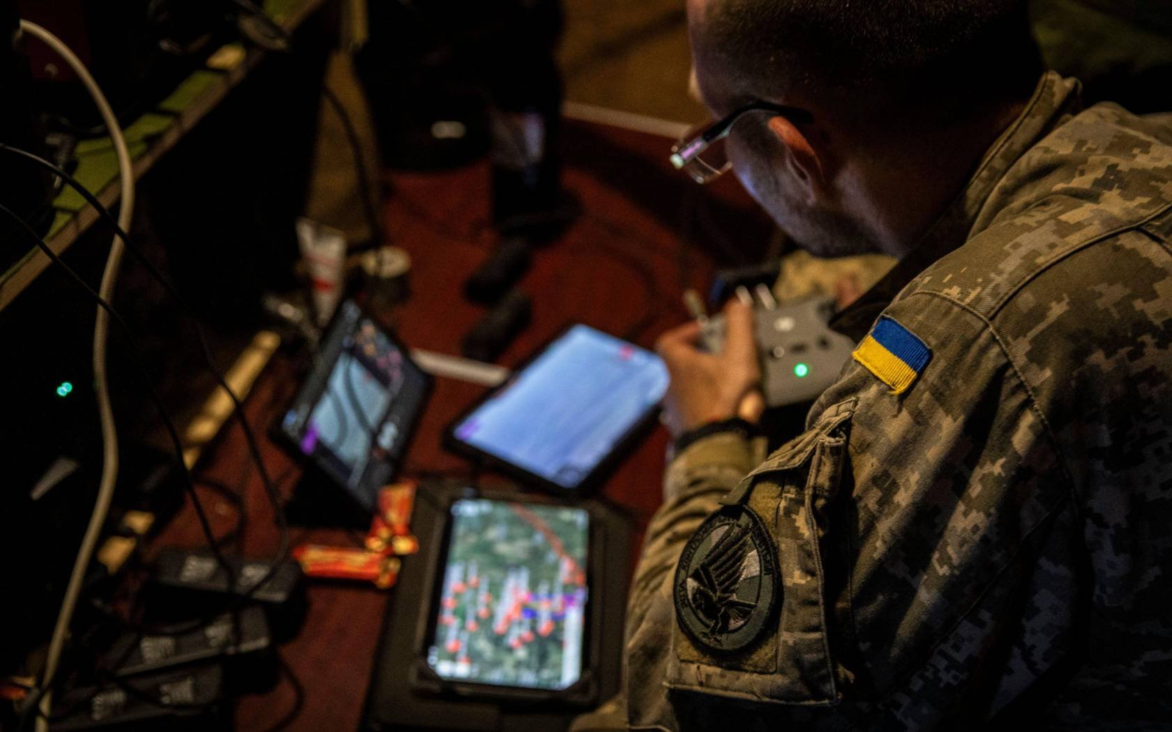A soldier from the 110th Territorial Defense Brigade seen controlling a drone for surveillance at an undisclosed position in Zaporizhzhia Oblast, Ukraine.