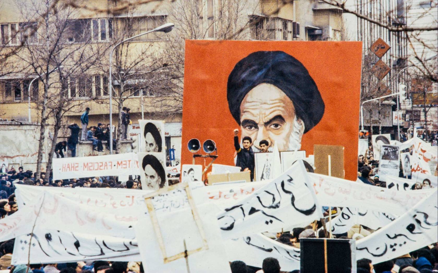 In January 1979, huge crowds on the streets of Tehran, Iran, celebrate Shah Mohammed Reza Pahlavi's decision to leave the country and go into exile.