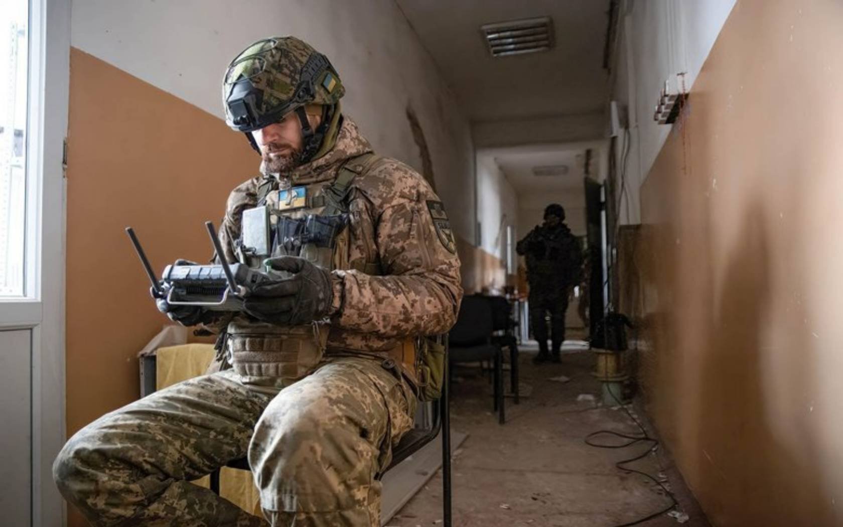 Ukrainian drone operator Leonid works to correct artillery fire in the city of Bahkmut.