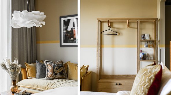 Soffa, säng och garderob i deluxerum