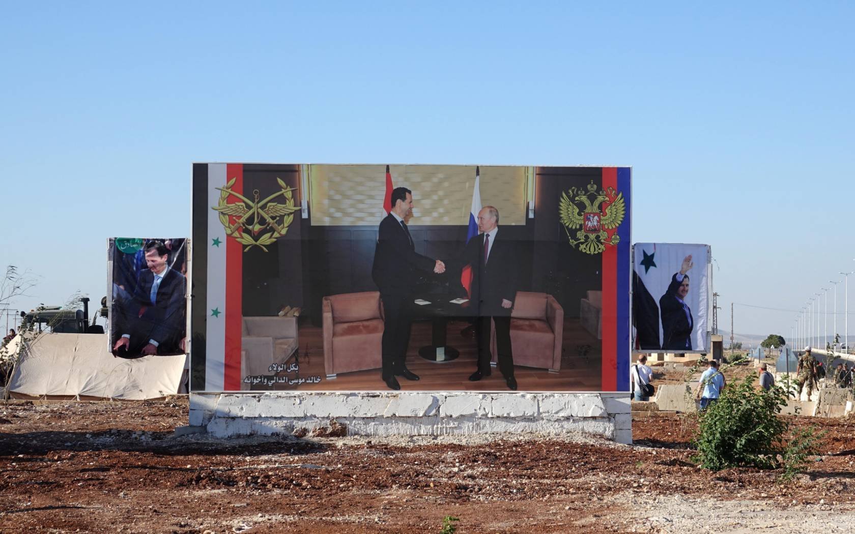 A 2018 poster in the city of Rastan shows Bashar al-Assad and Russian President Vladimir Putin as allies.