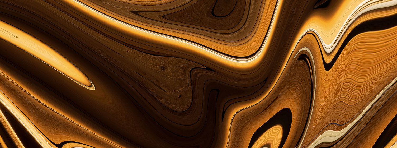 A swirly photo of wooden boards that is a mixture of different shades of brown and gold.