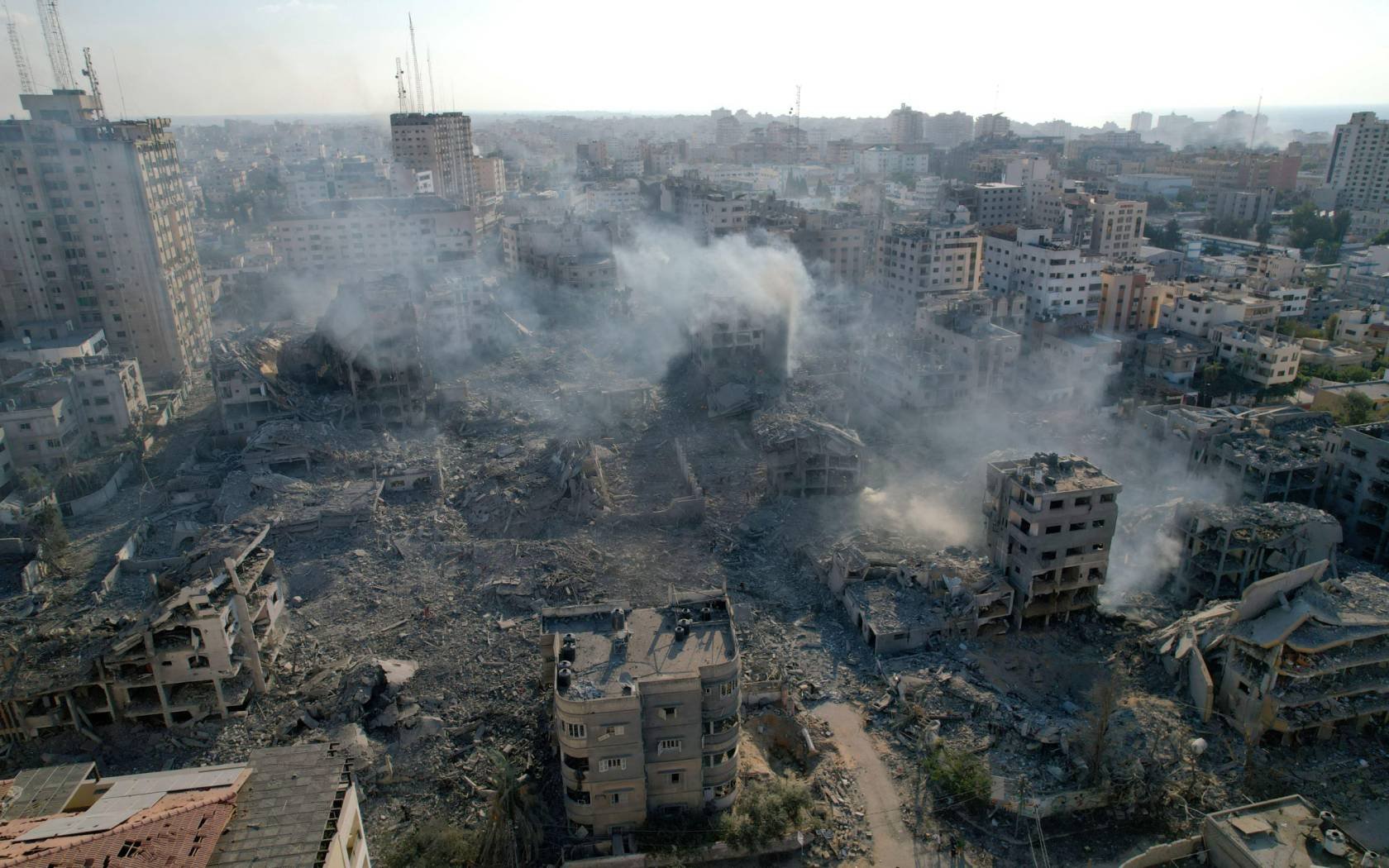 Widespread damage in Gaza City after bombardment by Israeli forces.