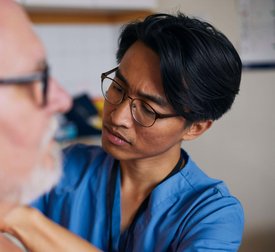 Doctor examining patient in medical clinic