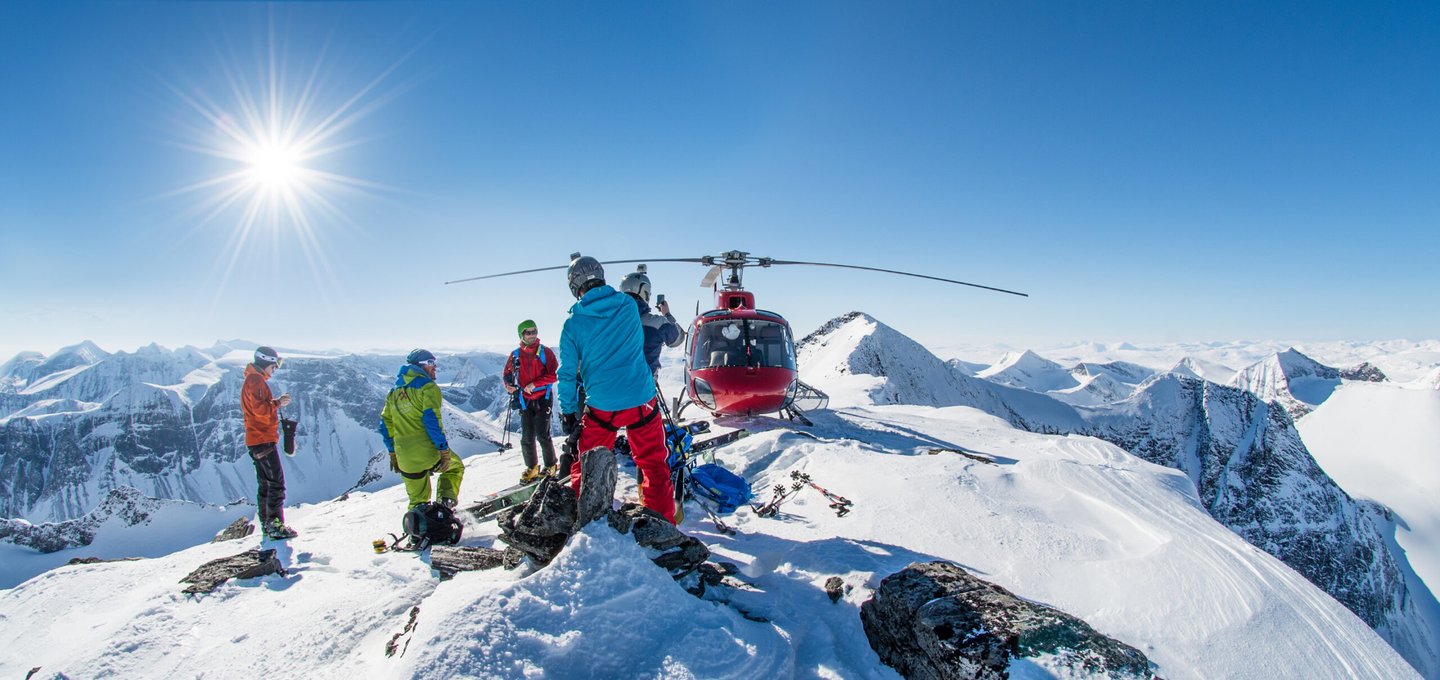 heliskiing on a mountain peak