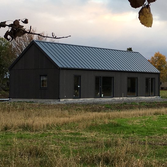 Beautiful custom dark facade with large exposures