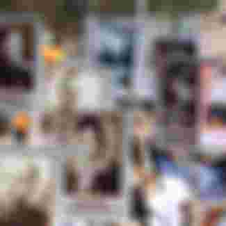 People carry portraits of their relatives - soldiers of the Second World War - as they take part in the Immortal Regiment march in downtown Moscow.