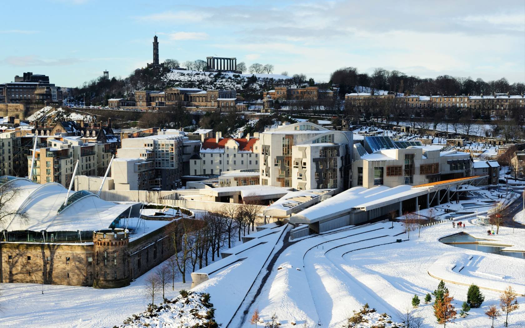 The Scottish Parliament building in the snow from Salisbury Crags, Edinburgh.