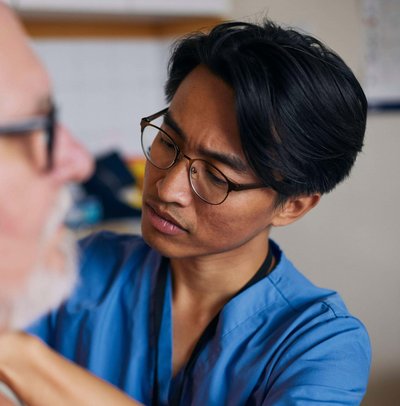 Doctor examining patient in medical clinic