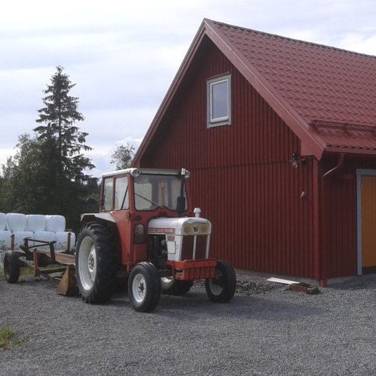 Loft style wood accented double doors with top level window