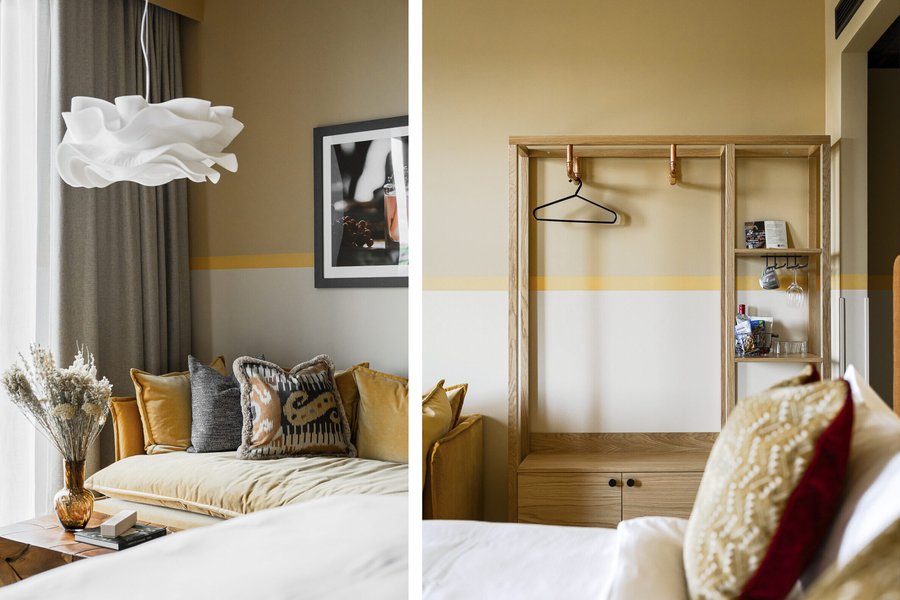 Soffa, säng och garderob i deluxerum