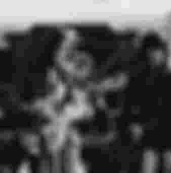 Eric Clapton, John Lennon (1940 - 1980) and Keith Richards performing together at the Rolling Stones Rock And Roll Circus, Internel Studios in Stonebridge Park, Wembley, December 1968.