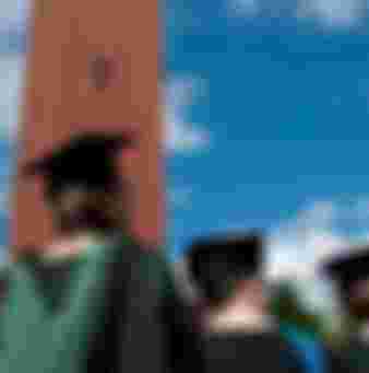 Students graduating from Birmingham University, England. Credit: Malcolm McDougall Photography / Alamy Stock Photo.