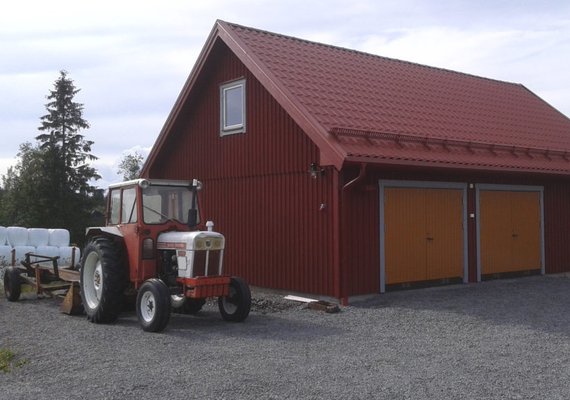 Loft style wood accented double doors with top level window