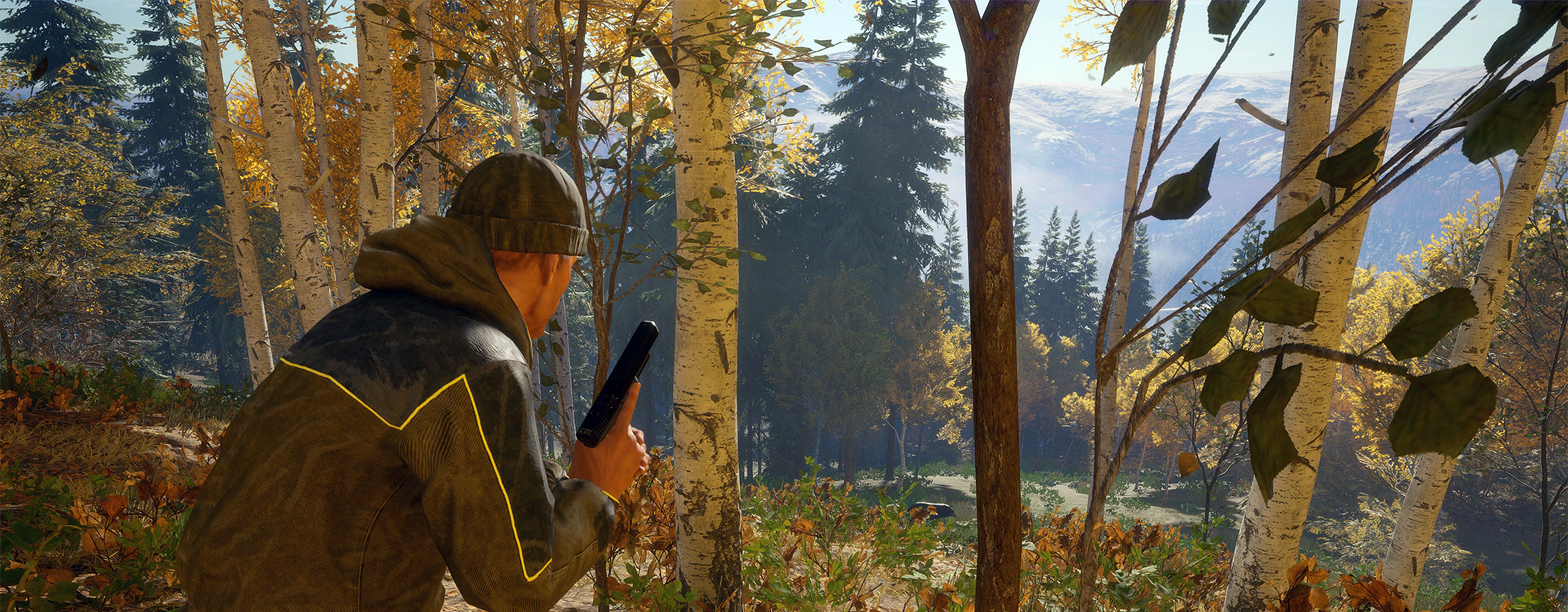 Hunter using the cover of trees to stalk an animal with the 10mm Davani drawn.