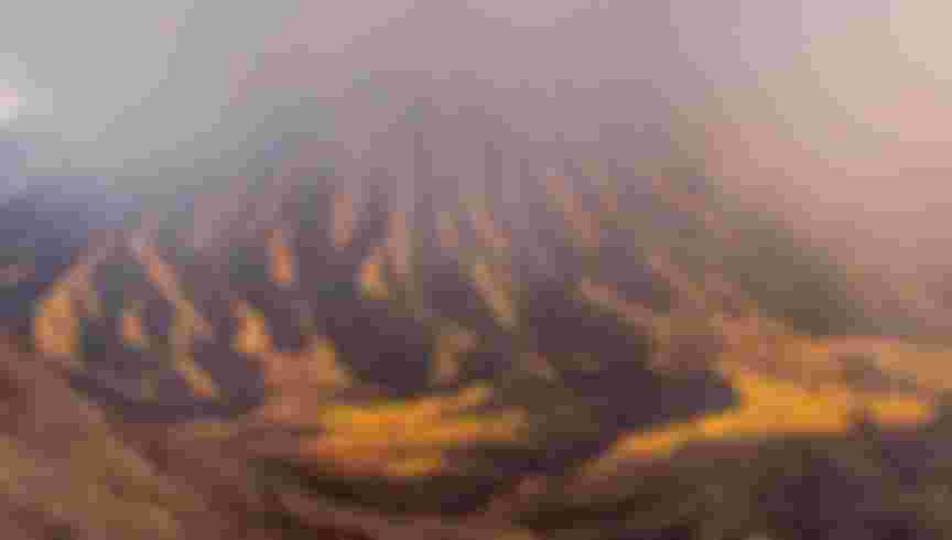 Mount Bromo (Gunung Bromo) seen at dawn on 11th June 2018, East Java, Indonesia. The active volcano is park of the Bromo Tengger National Park, sitting on a plain called the sea of sand, it is possible to look into the crater of the volcano to see the smoke and steam emerging from it, lava is not visible. (photo by Phil Clarke Hill/In Pictures via Getty Images)