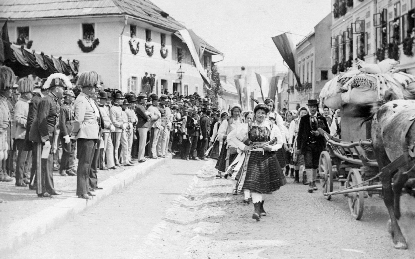 Pre-Great War Austrian soldiers watching a pageant.